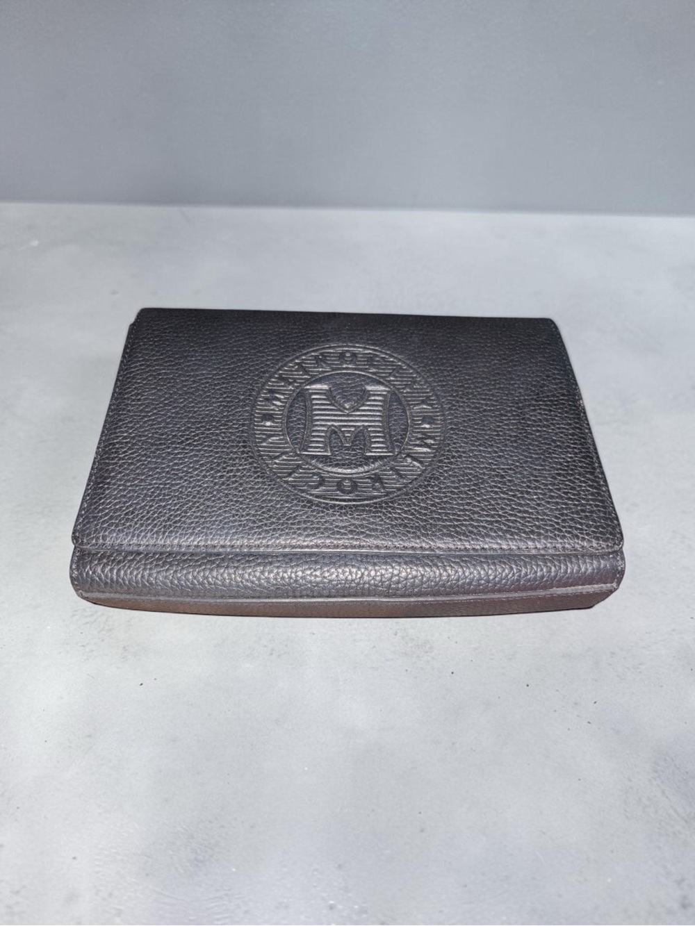 Classic Black Leather Crossbody Wallet with Embossed Crest